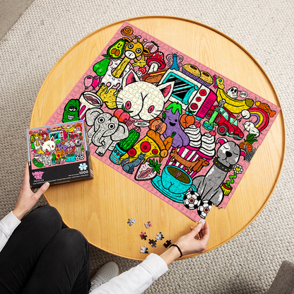 Dirty Doodles 1000-piece puzzle finished and laid out on table